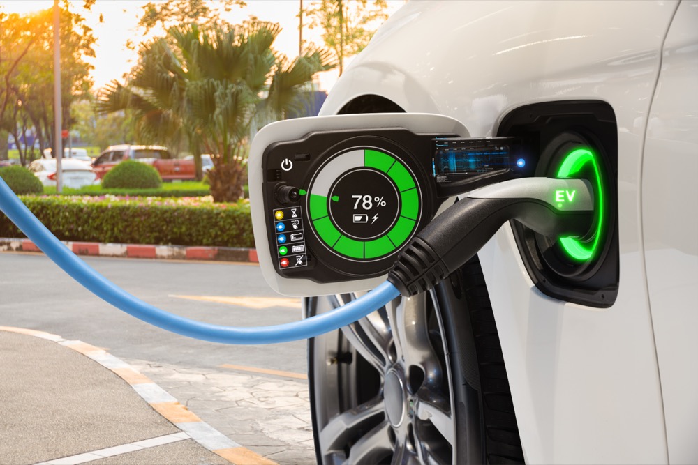 Electric vehicle changing on street parking with graphical user interface, Future EV car concept Electric Vehicle Charger Station
